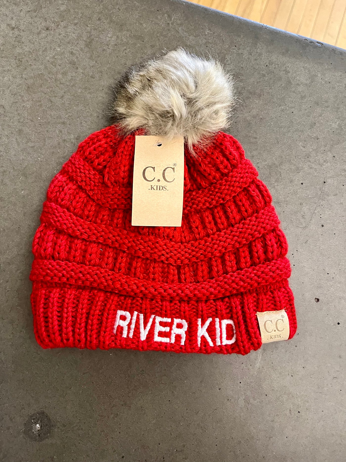 River Kid pom hat